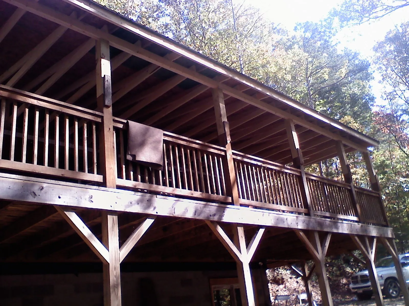 Timber framing under a new elevated porch and deck — Roof Leak Repair in Beaman by Roofing Brothers